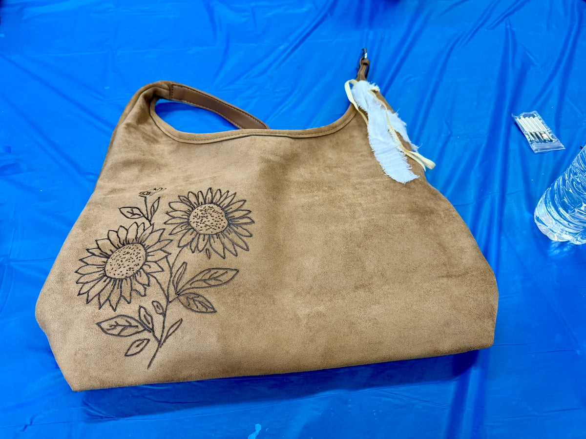 11/14/2026 - He Hunts Deer, We Burn Gear: Suede Hat or Hobo Bag Burning Workshop - 1:00pm - H&S East Michigan Studio